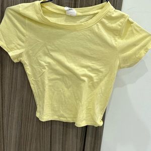 Yellow slightly cropped shirt from Tilly’s